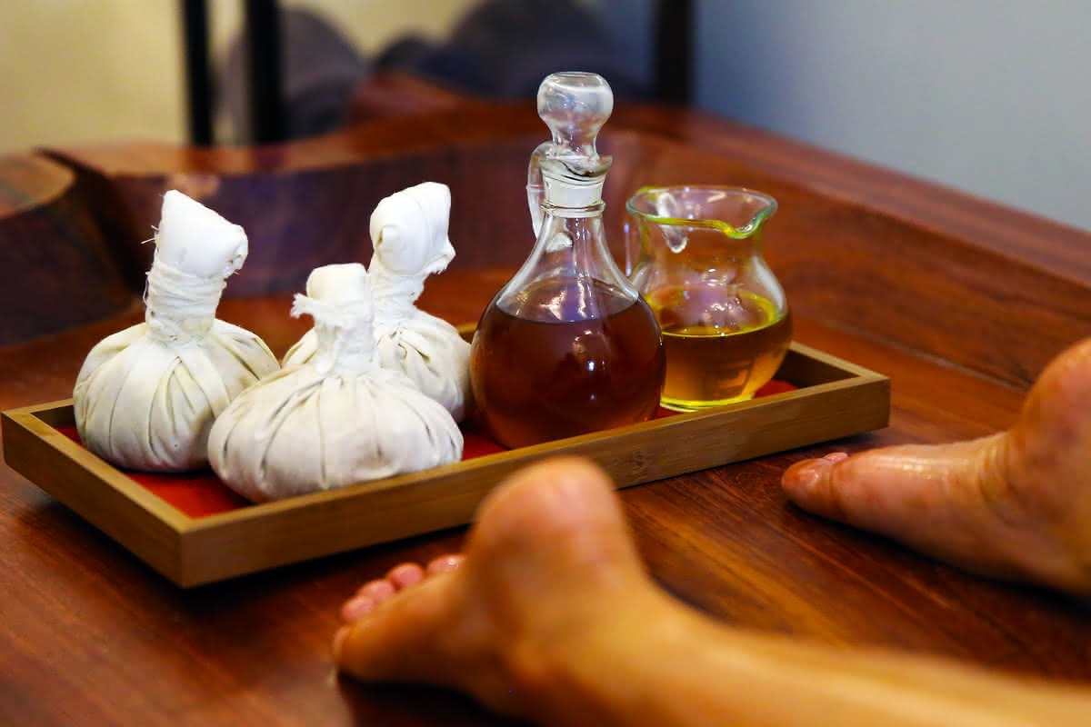 Abhyanga full-body therapeutic oil massage - Traditional Kerala Ayurvedic therapy at Healers Clinic Dubai with warm herbal oils