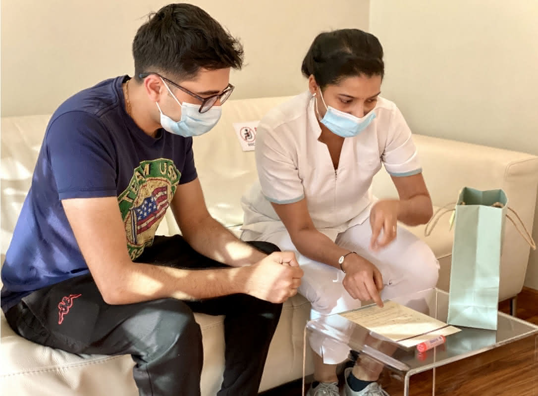 Primary care consultation session - Professional doctor conducting comprehensive medical assessment and patient evaluation in modern healthcare setting at Healers Clinic Dubai