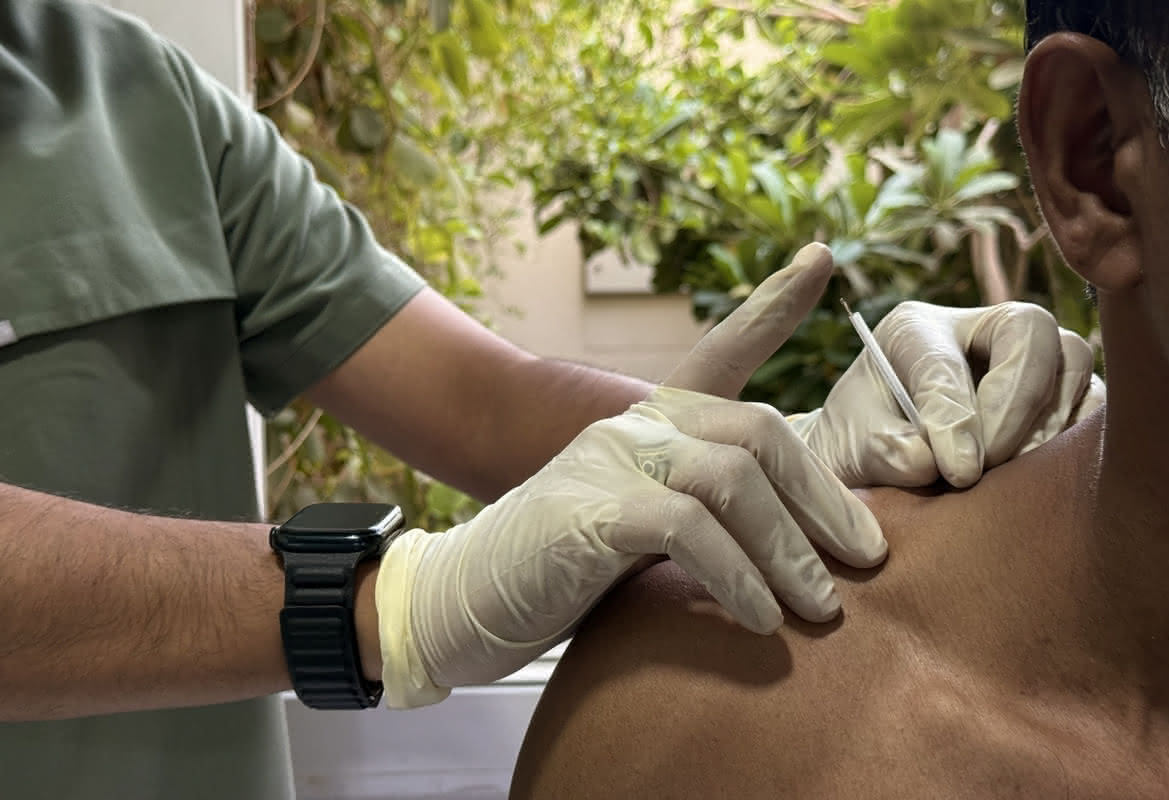 Dry needling therapy for trigger point release - Licensed physiotherapist performing precision acupuncture and myofascial treatment at Healers Clinic Dubai for pain management